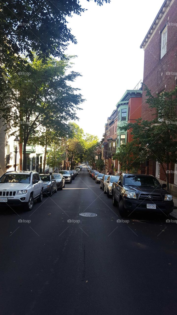 car lined Boston street