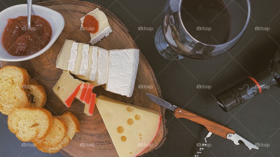 red wine and cheeses