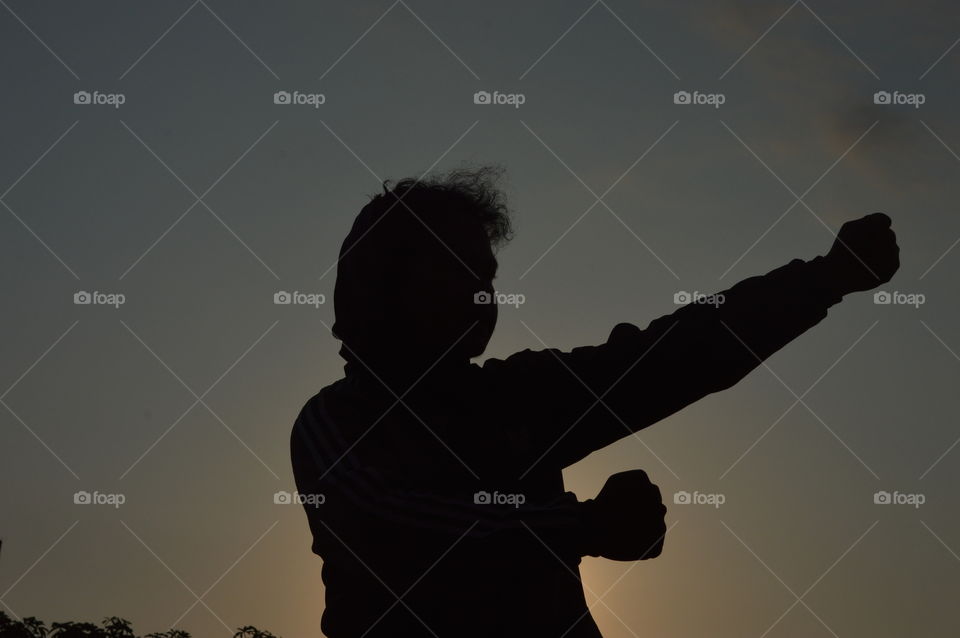 Silhouete picture of a martial artist man