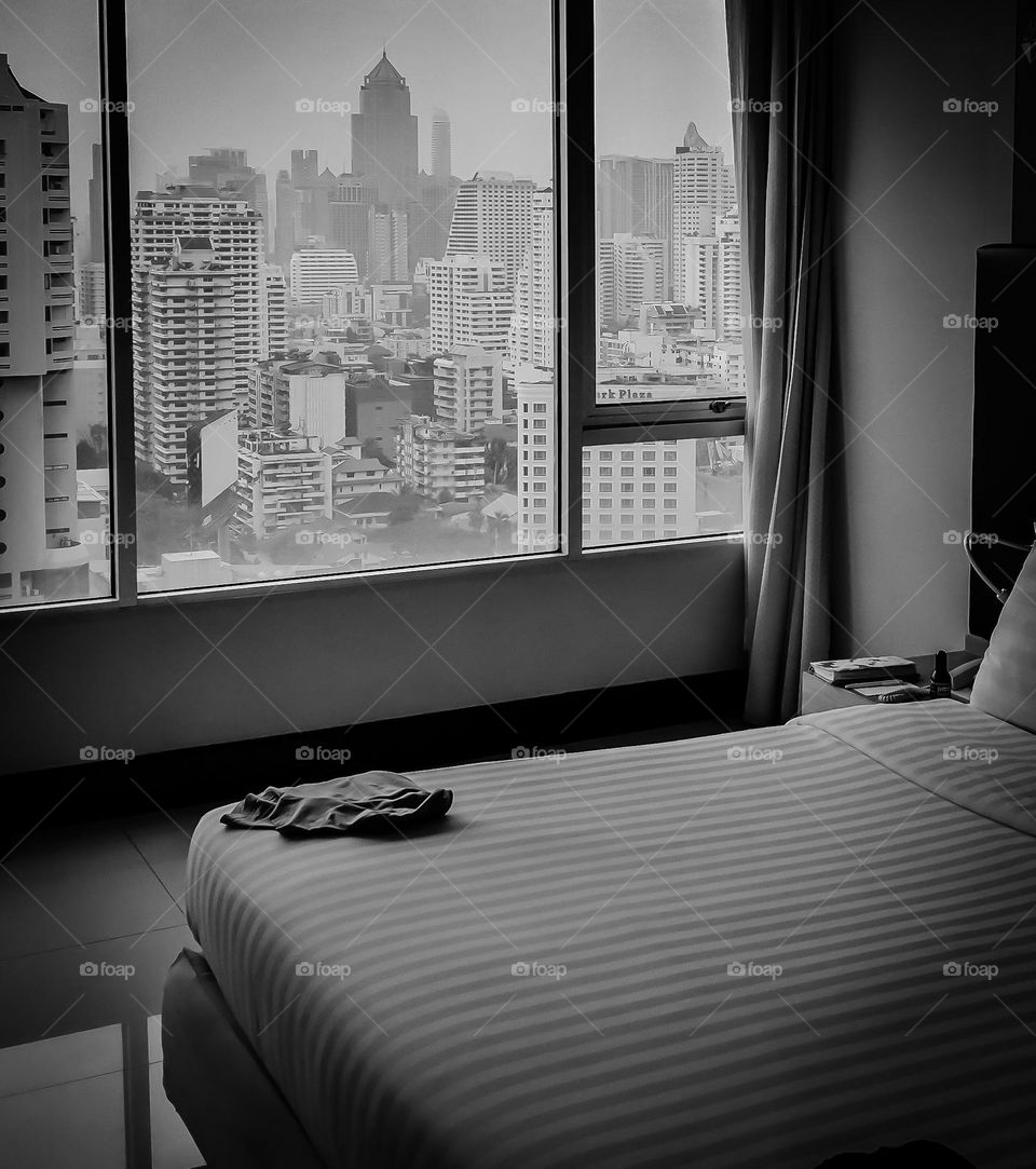 Scenic view of skyscrapers from bedroom's window