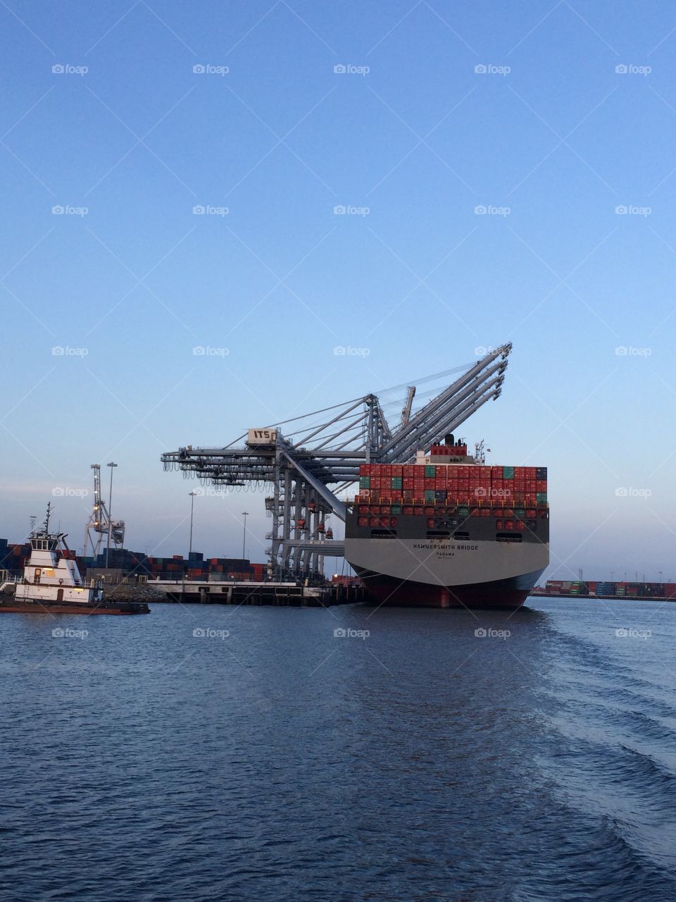 Port of Long Beach cargo ship and cranes 