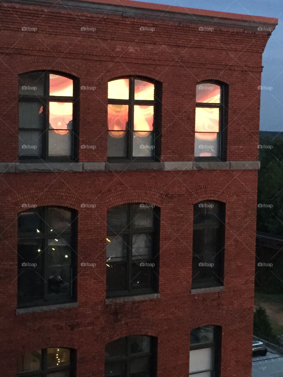 Sunset reflections. Sunset reflecting off the neighboring buildings windows. 