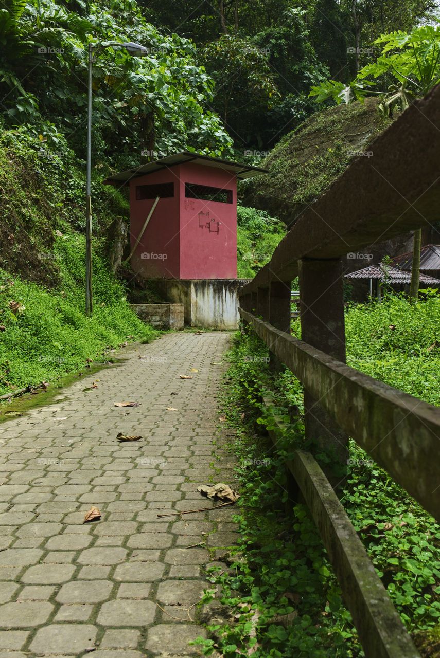 Perspective towards a reservoir along a road