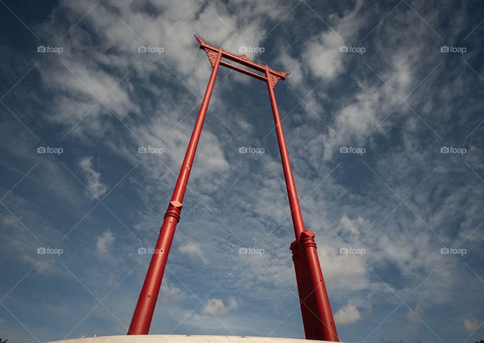 The Giant Swing (Thai: เสาชิงช้า, Sao Ching Cha) is a religious structure in Bangkok, Thailand, Phra Nakhon district, located in front of Wat Suthat temple. It was formerly used an old Brahmin ceremony, and is one of Bangkok’s tourist attractions.
