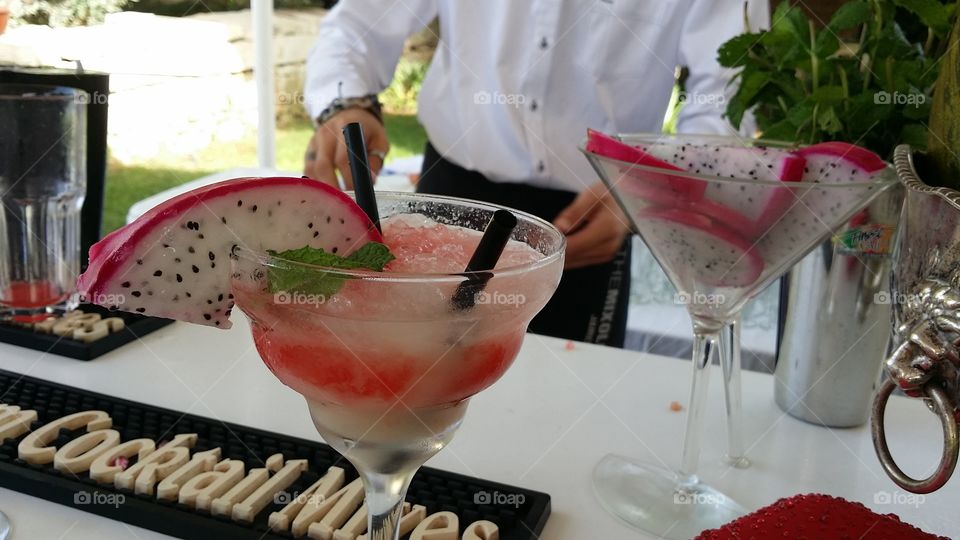 Making cocktails at a wedding