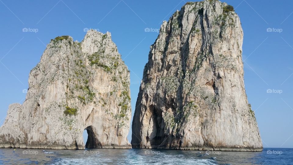 hole in rock. boat tour around island of Capri