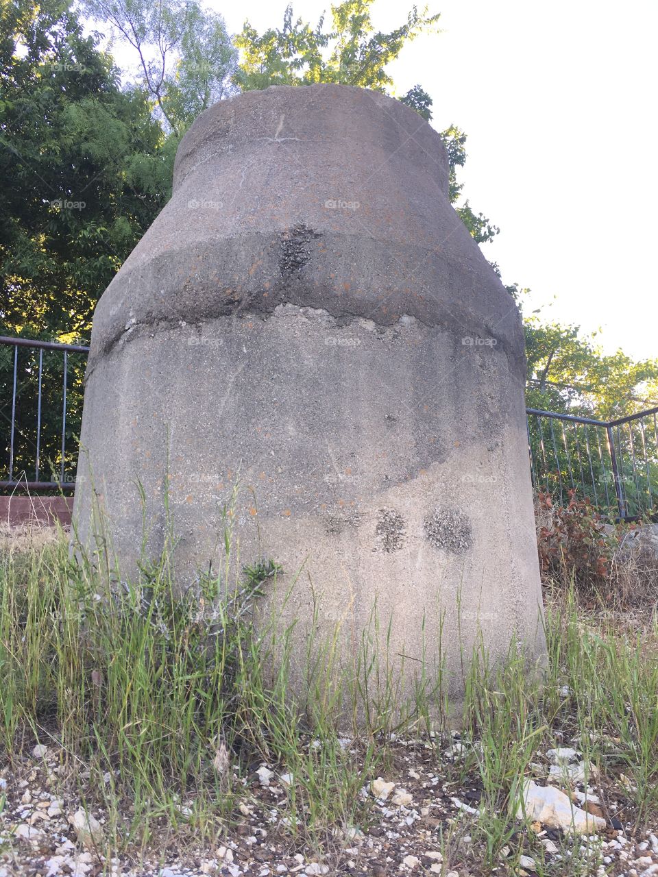 Large concrete structure near a creek. 