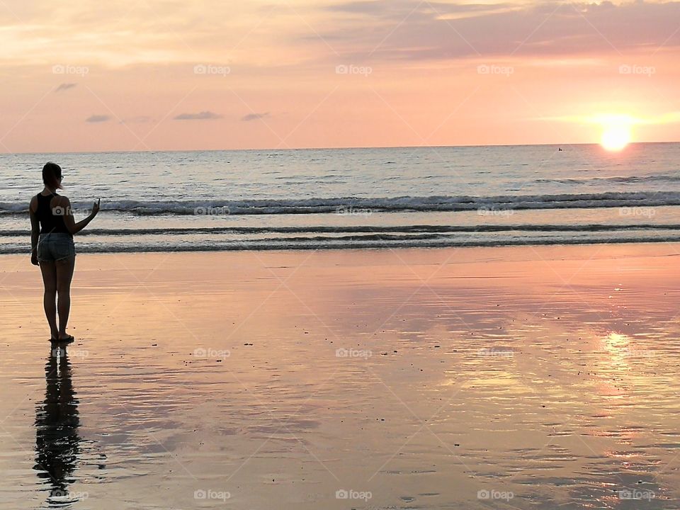On the beach at sunset
