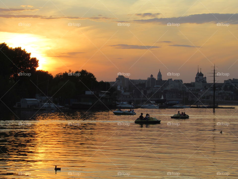 sunset on the Voronezh River in the city reservoir