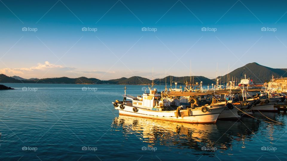 Parking boats and reflection with Sunset at Wando beach, South Korea