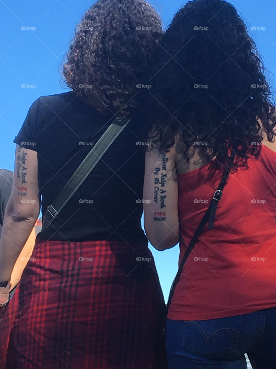 Two girls - tattoo don’t judge a book by its cover 