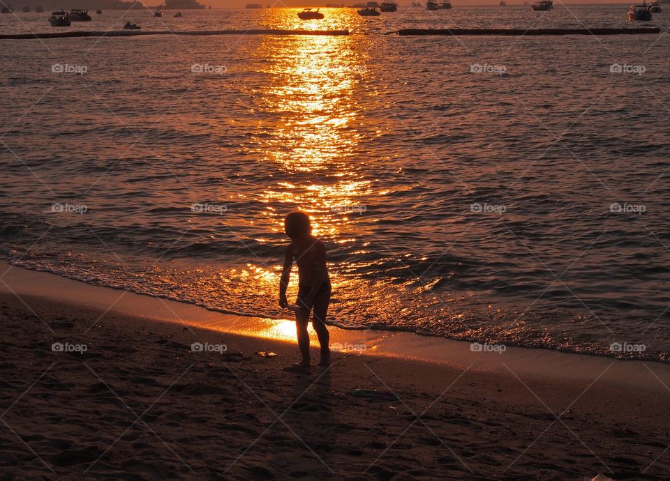 Sunset reflection and silhouette