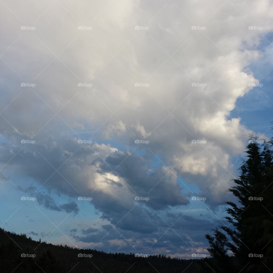 Between Storms. clouds