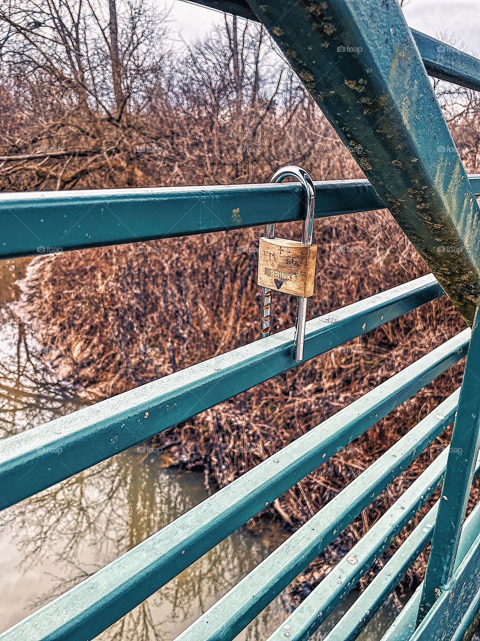 Metal lock on metal bridge, metal bridge in Ohio, nature preserve with metal bridge and lock, parks in Ohio, Midwest outdoors, locks of love on a bridge, lock on bridge bars, locks in a park in Dayton Ohio, battle metal is better