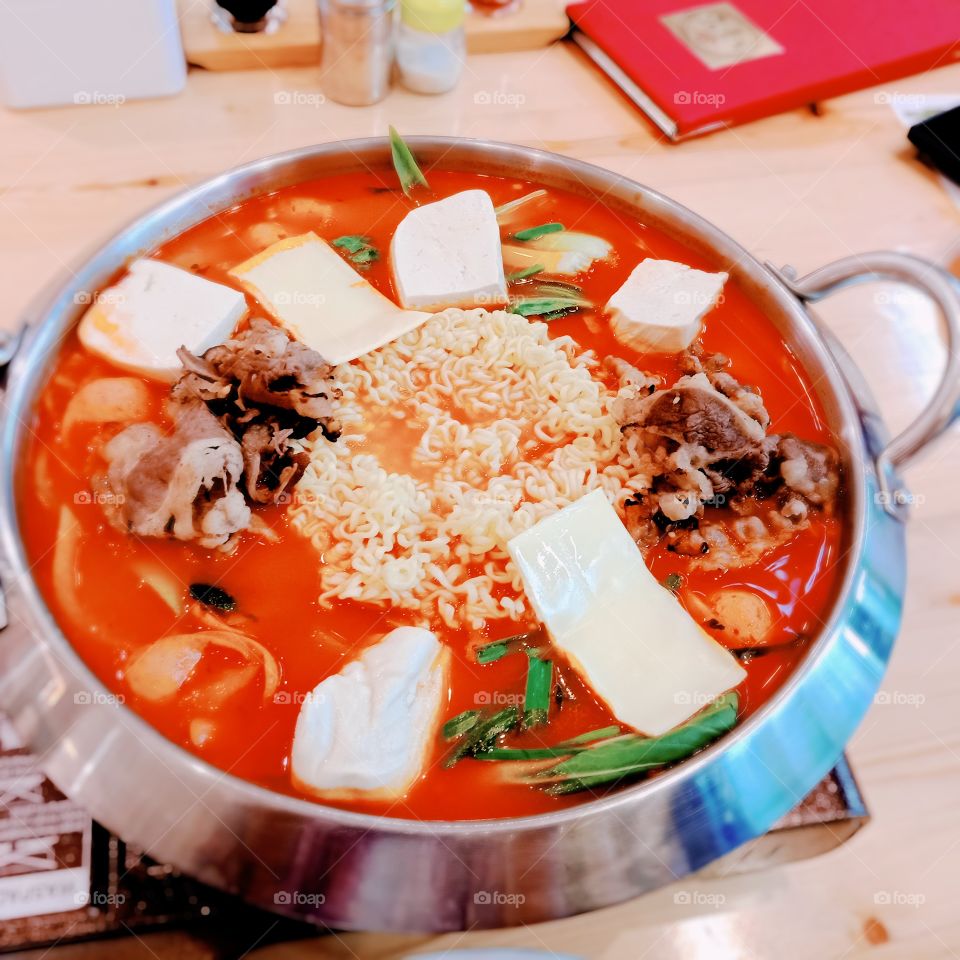 Budae Jiggae (Korean Army Stew). Korean traditional dish consist of tofu,  beef, noodle, sausagge and chesse