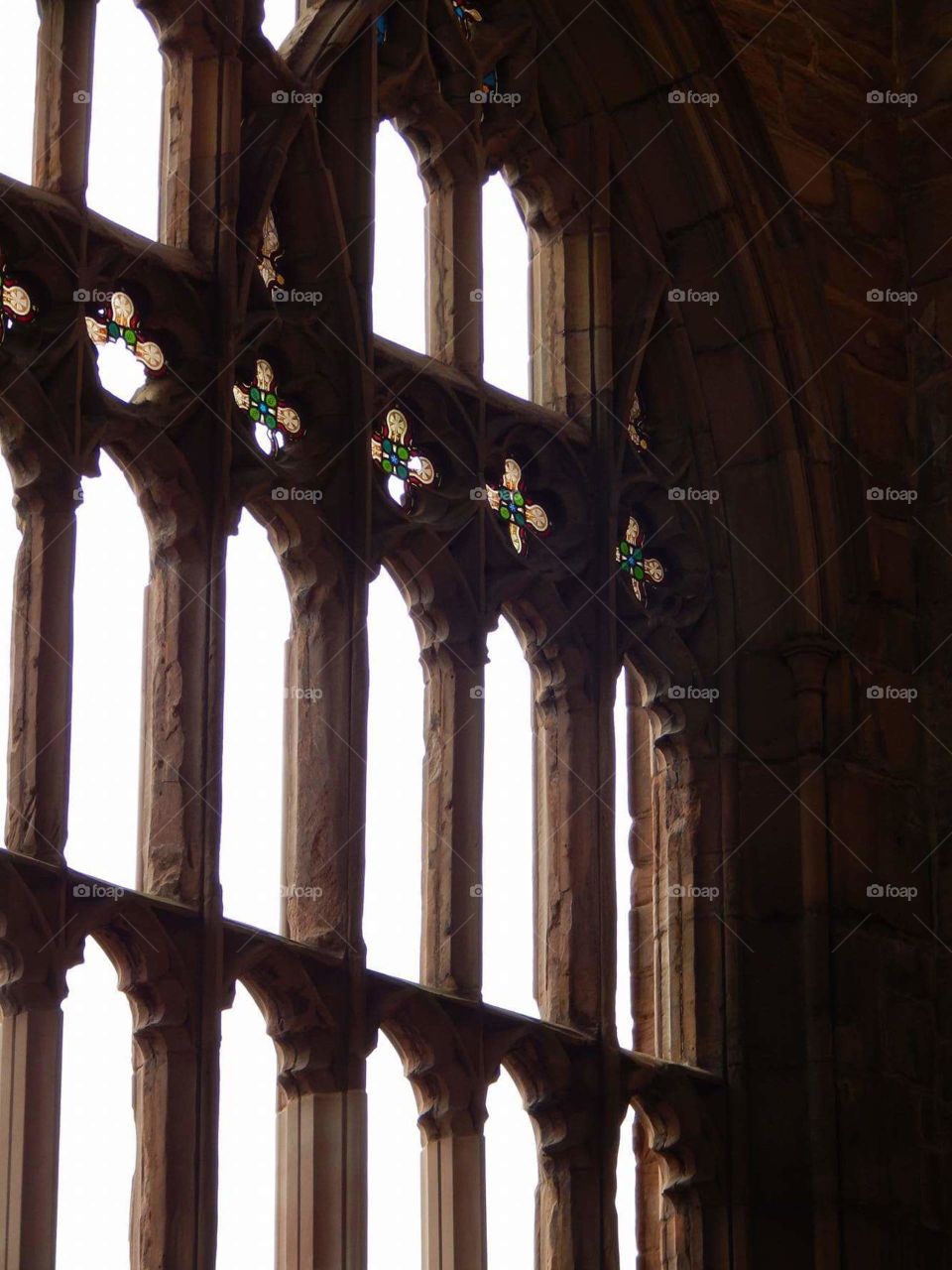 backlit stained glass broken window