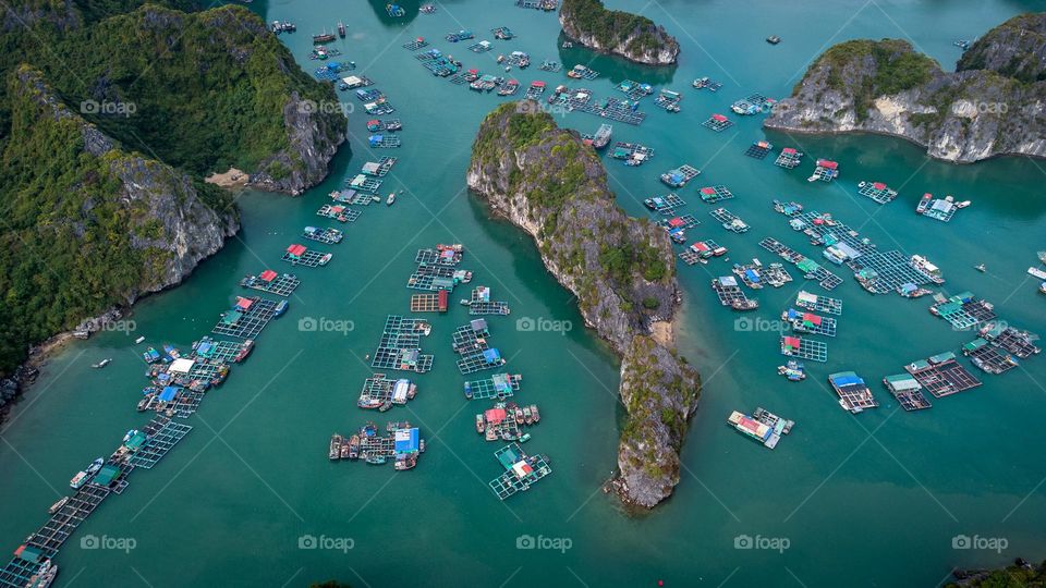 Beautiful Halong Bay, Vietnam from above. Those boat belong to fishing village. 