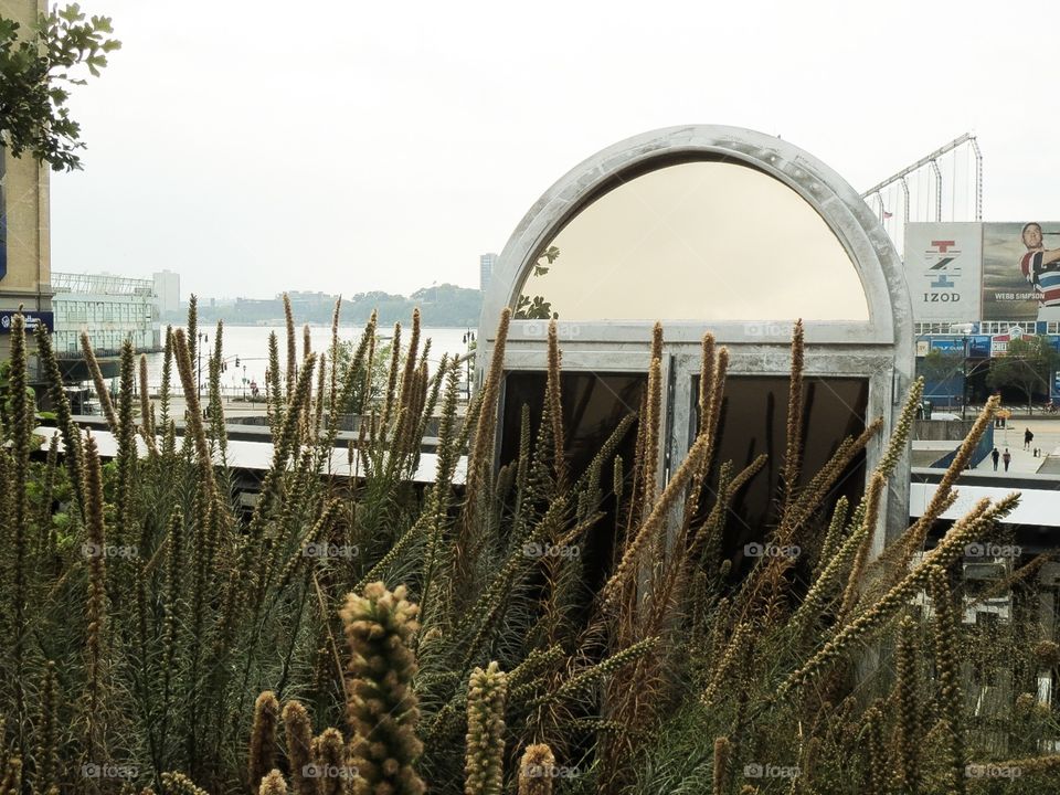Window in the HighLine . A window as an artistic expression on the HighLine in New York City. A window to the world of Manhattan!
