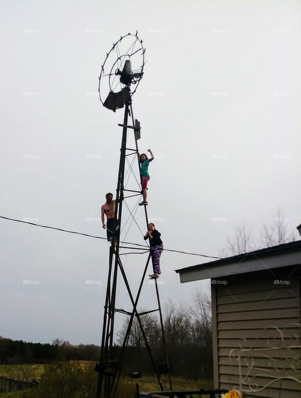 outdoor fun climbing an old windmill