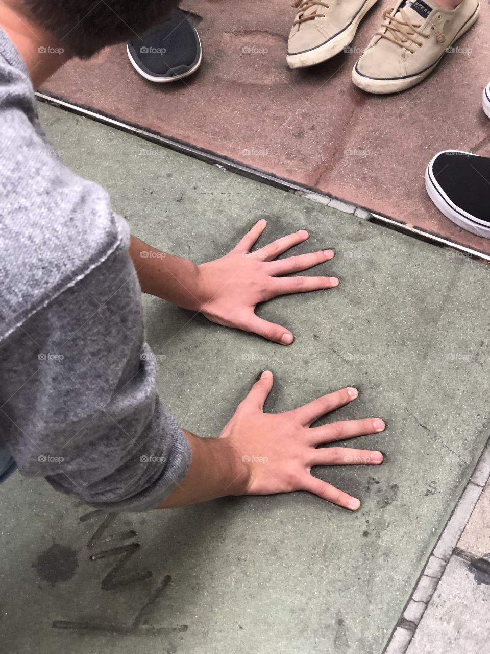 The Hollywood Walk of fame, and its corresponding hands- somehow my classmates hands fit perfectly.