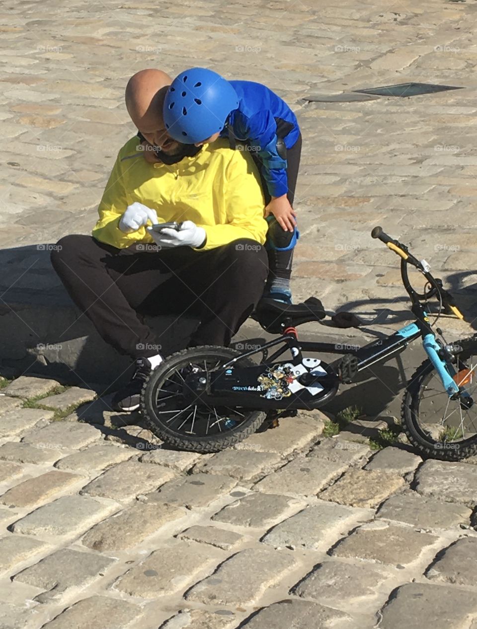 Father and son by a sunny Sunday 