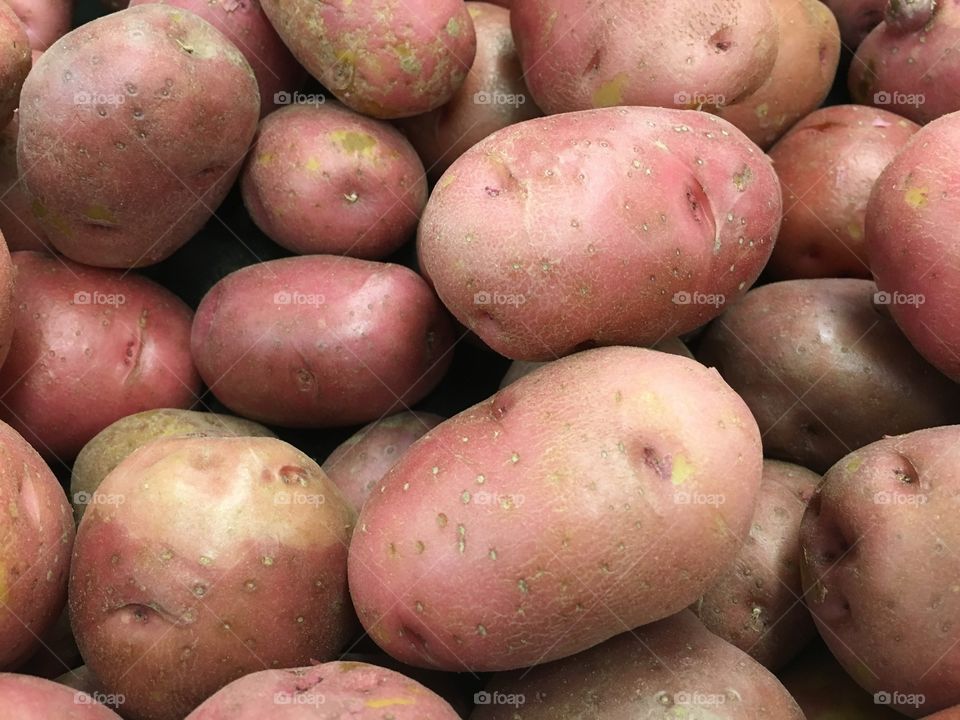 Picture of a bunch of red Potatoes. We have more pictures on our profile that include: 

Healthy Eating, Fruit, Table, Ingredient, Directly Above, High Angle View, Green Color, Plate, Freshness, Organic, Kale, Cutting Board, Close-up, Avocado, Photography, No People, Design, Elegance, Still Life, Food and Drink, Textured, Variation, Lime, Nature, Broccoli, Herb, Rustic, Kiwi - Fruit, Basil, Beauty In Nature, Pepper - Vegetable, Cabbage, Color Image, Green Pea, Pear, Plant, Concrete, Gray, Okra, Studio Shot, Gray Background, Horizontal
