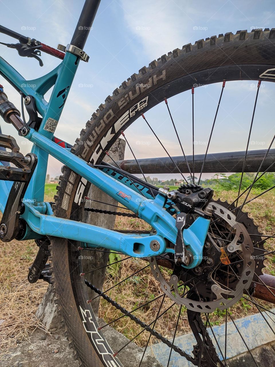 Focus on the bicycle rear wheel and gear