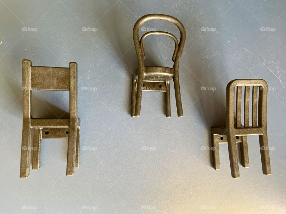 Chairs like hooks in the wall 