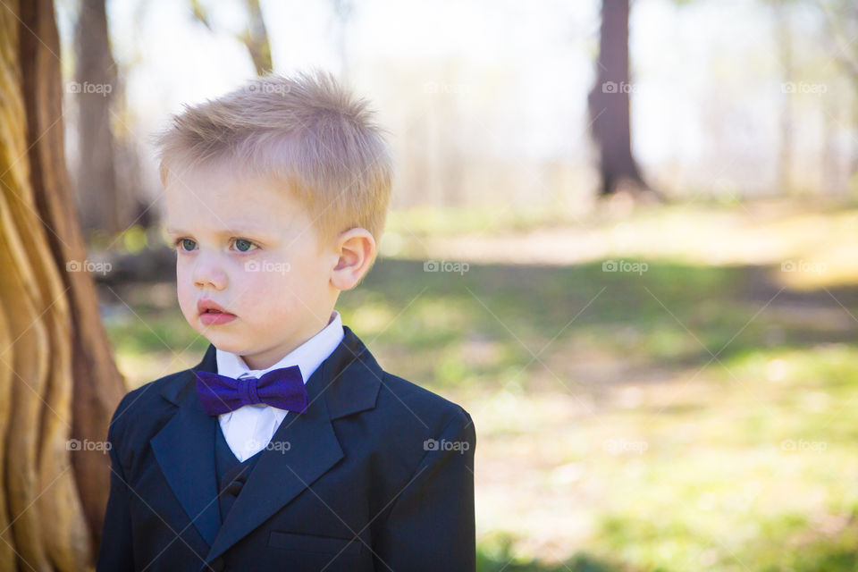 Portrait of a little boy in suit