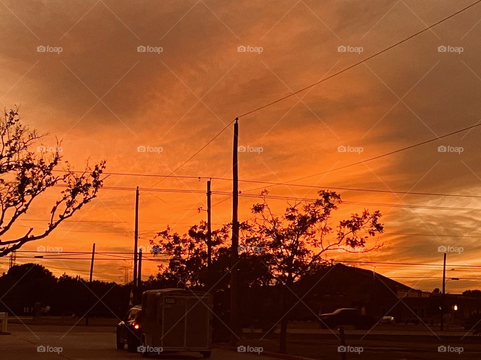 Just when the Twilight has completed, there is a calmness in the sky. Colours disappear. What is going on and in a startling Fashion the Evening Sky Opens Up into this huge Array of Bright Orange Clouds. And After it quickly disappeared WOW. 