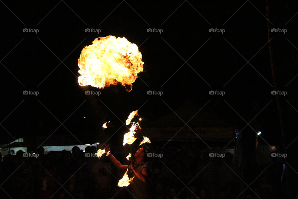 Busker playing with fire