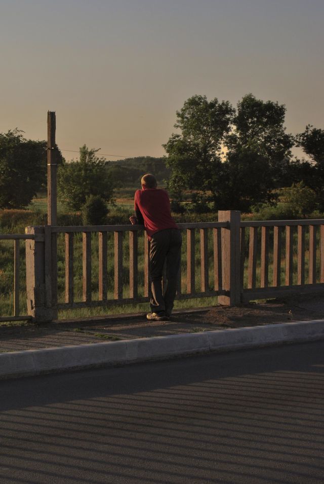 Watching the sunset alone