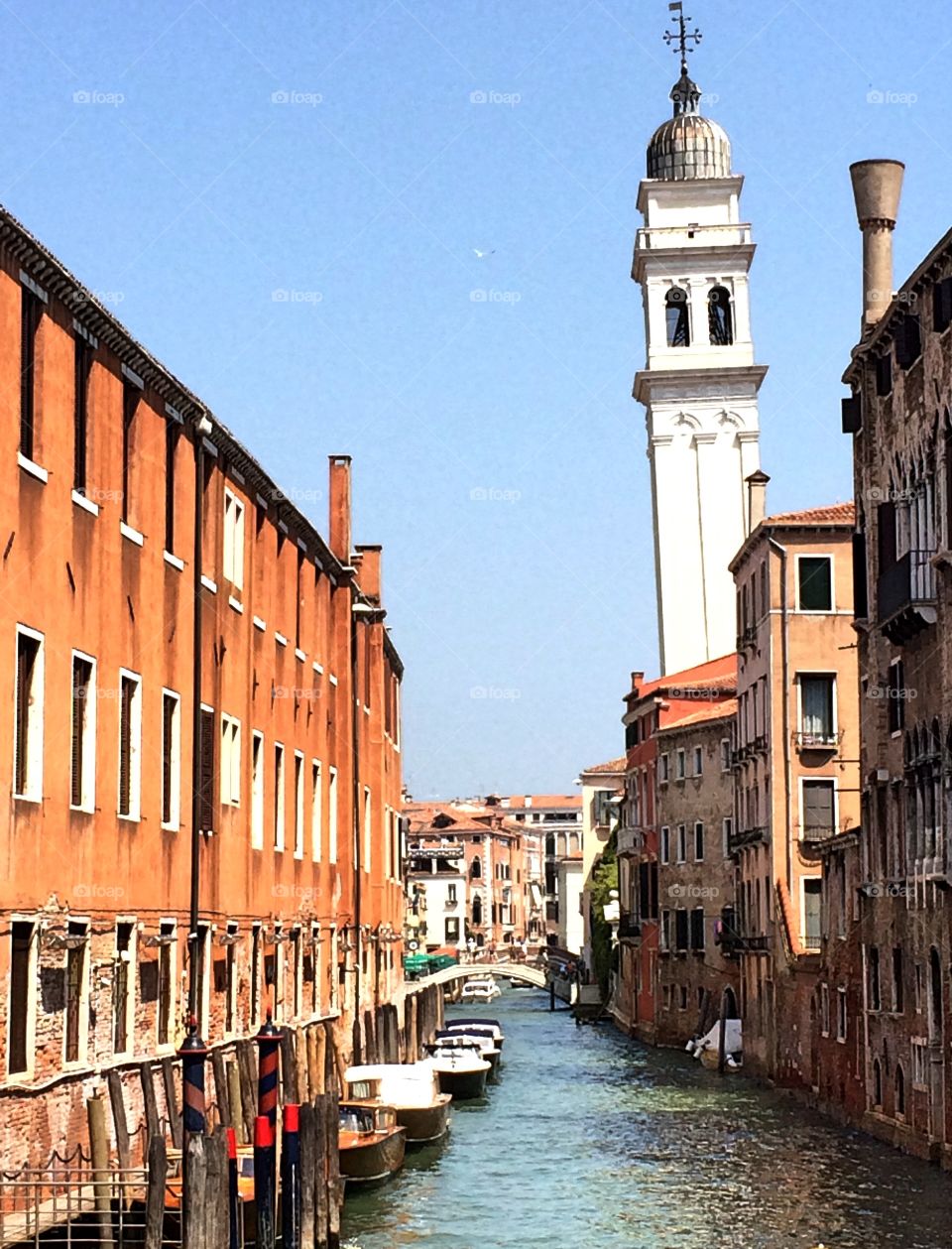 Summer in Venice. View of canal and historic buildings in Venice, Italy 