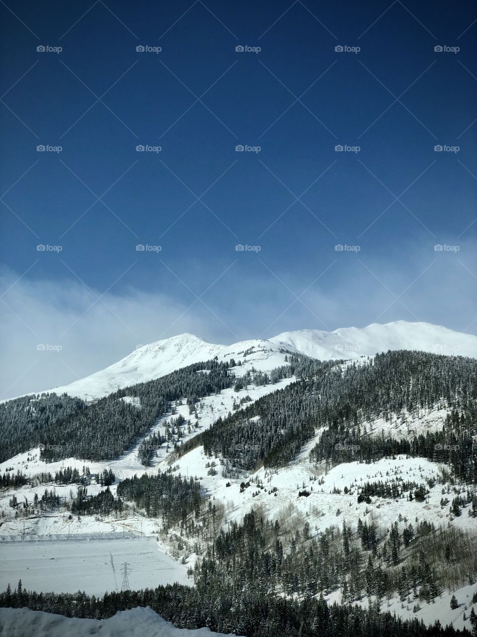 The snowy mountain range in autumn.