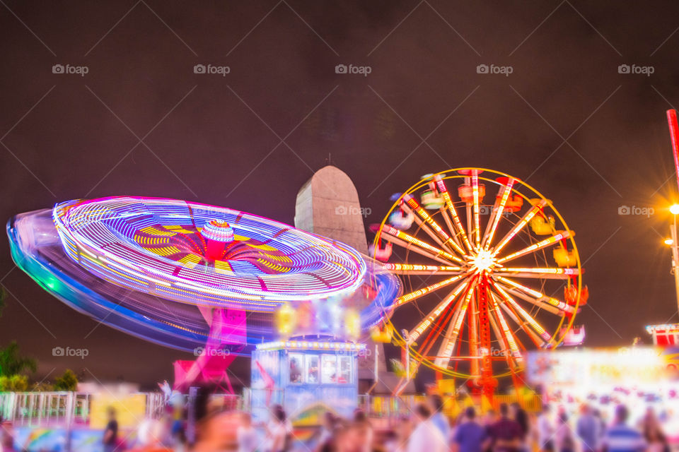 Amusement park illuminated at night