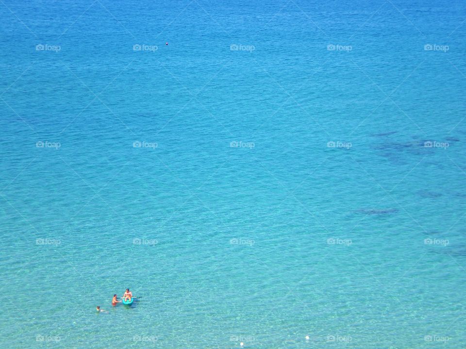 Sea of Palinuro with people  (Italy ).