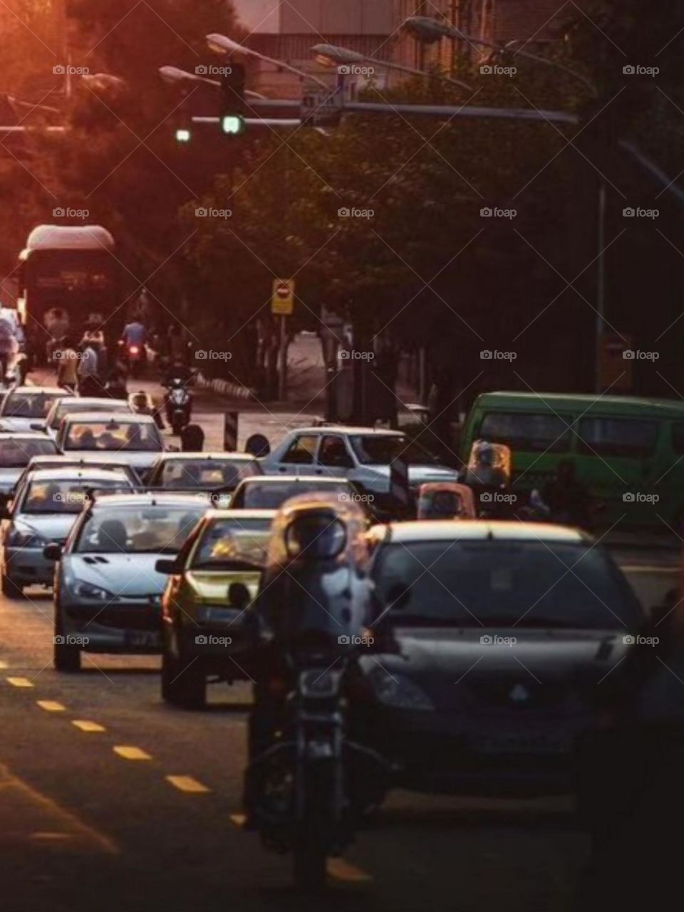 Small motorcycles get lost in the hustle and bustle of cars, but they are always ahead