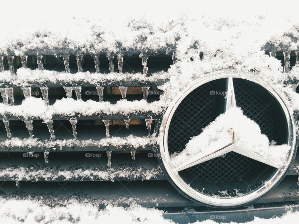 radiator of a Mercedes car in icicles