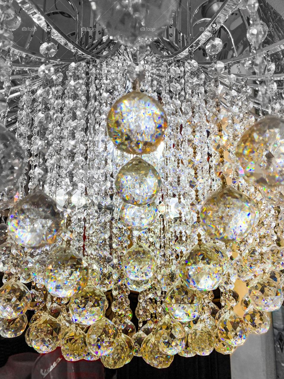 Geometry mission - circles.  Close up of crystal chandelier with multiple round balls hanging from it 