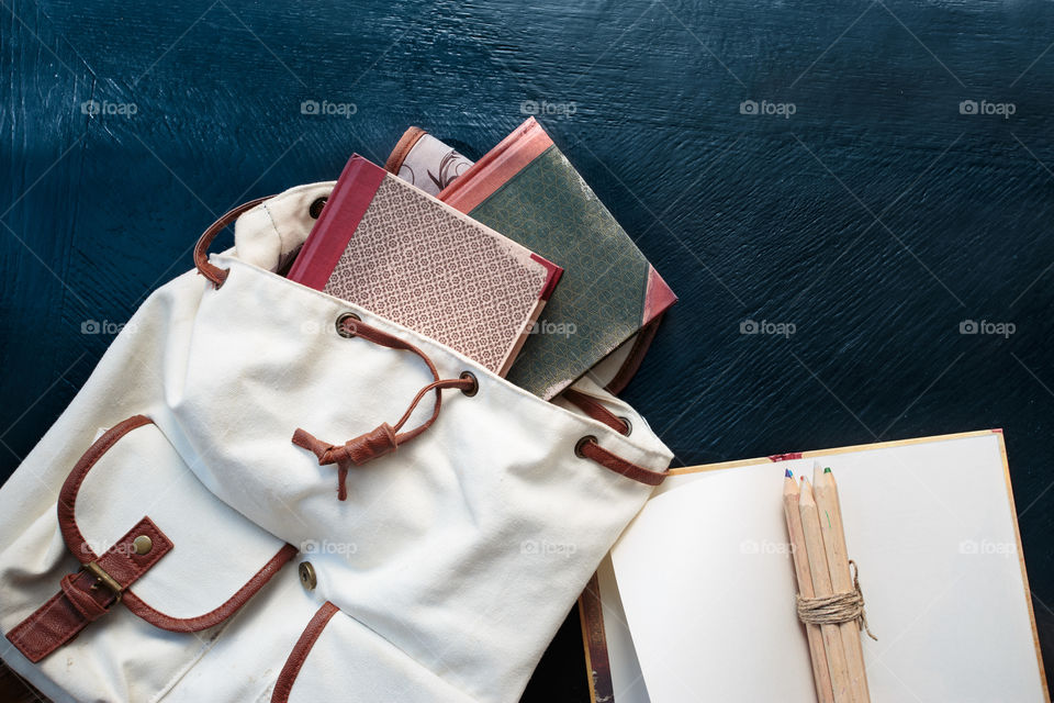 Books and pencils on desktop