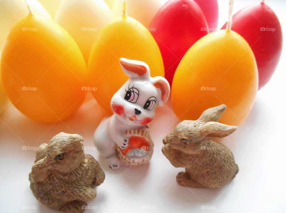 decorative rabbits souvenirs and colour eggs spring holiday, symbol New Year