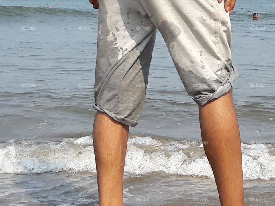 ocean water in motion waves foamy get a swim legs in sea seashore wet