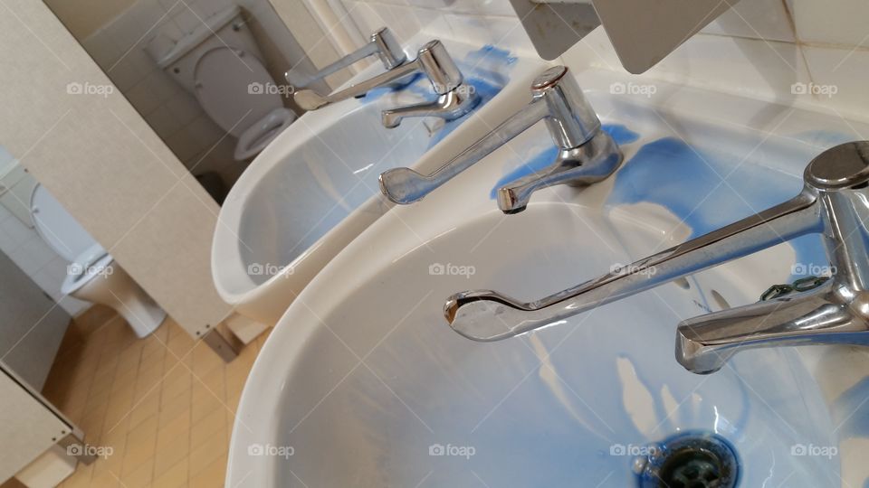 double sinks in a public toliet