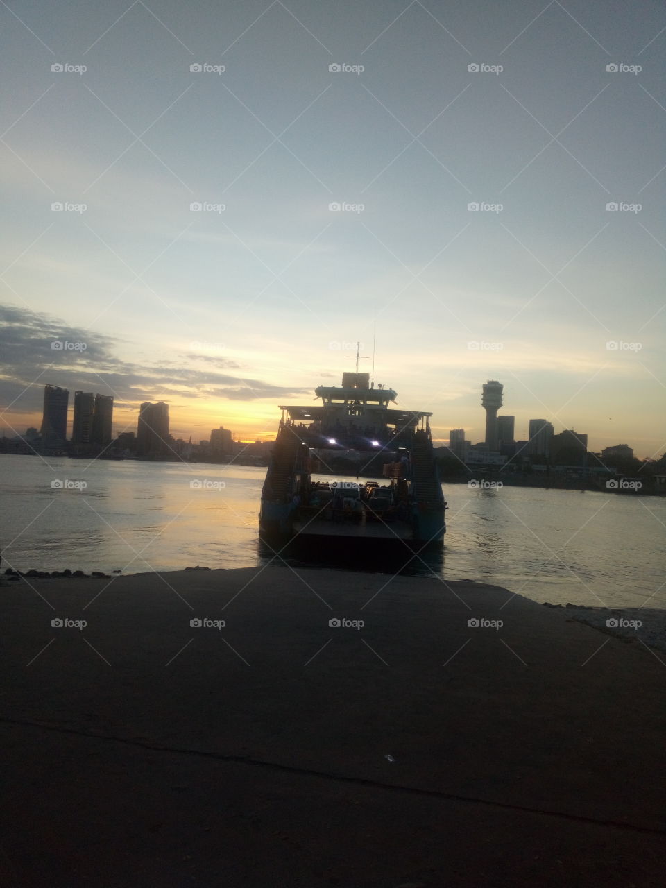 ferry cross sunset view