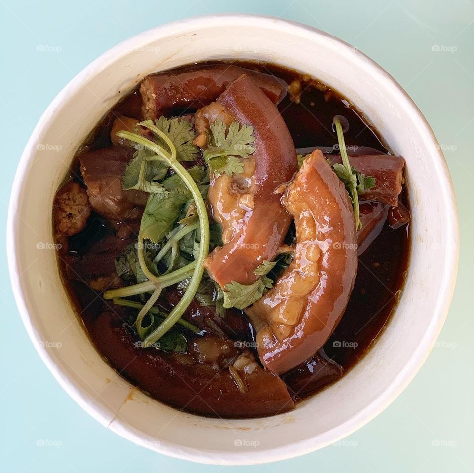 Teo chew bak kut Teh with fried chicken garlic, French beans with hae bee hiam, pig trotters and intestines meal