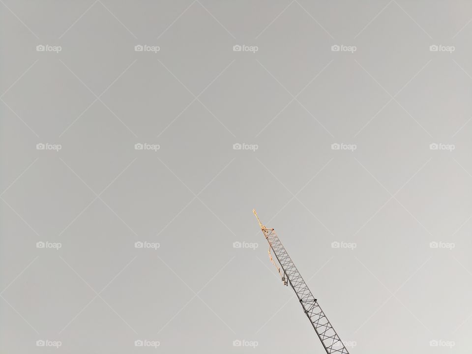 Crane against sky