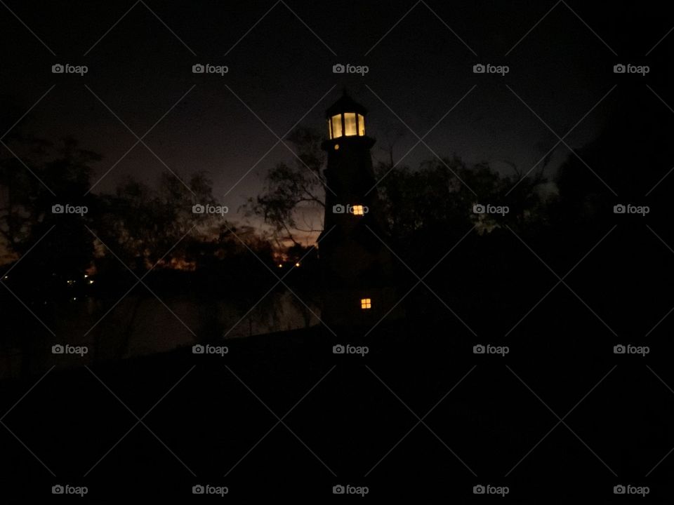 The Night is hear Lighthouse is gleaming into the setting. The beautiful day has passed and now the sky has switch to Night. 