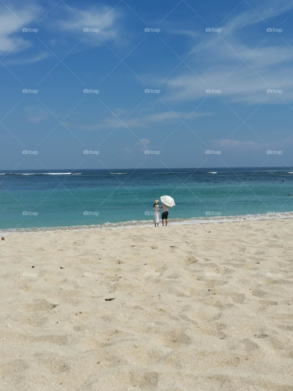 Seashore, beautiful beach, white sand, blue sky, sea.