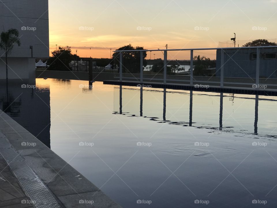 Sunset seem from the pool