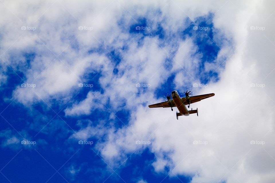 Airplane agains the blue sky 